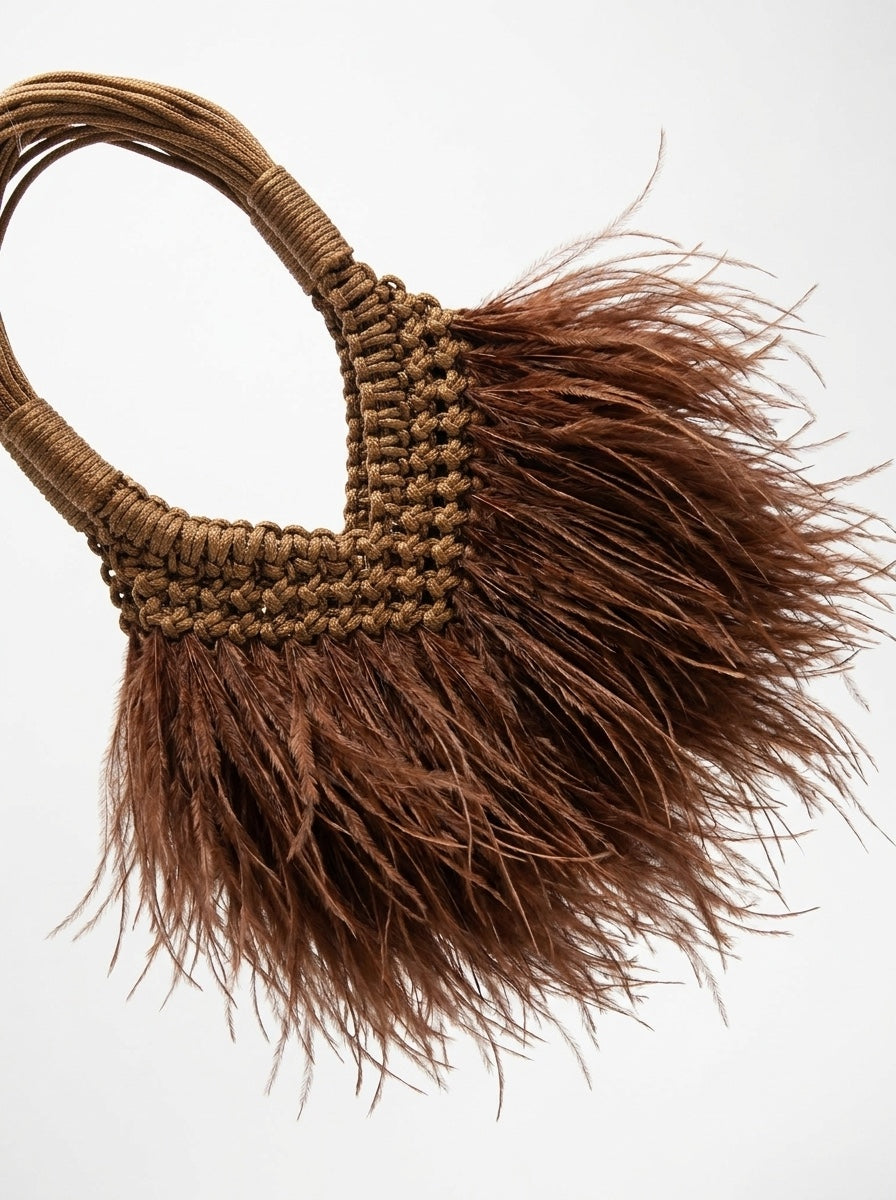 Close-up of macrame knotting and brown ostrich-look feathers